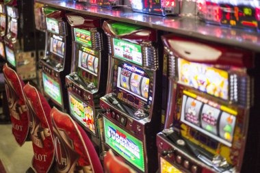 Ikan Jackpot game interface on mobile showing reel layout and bet controls